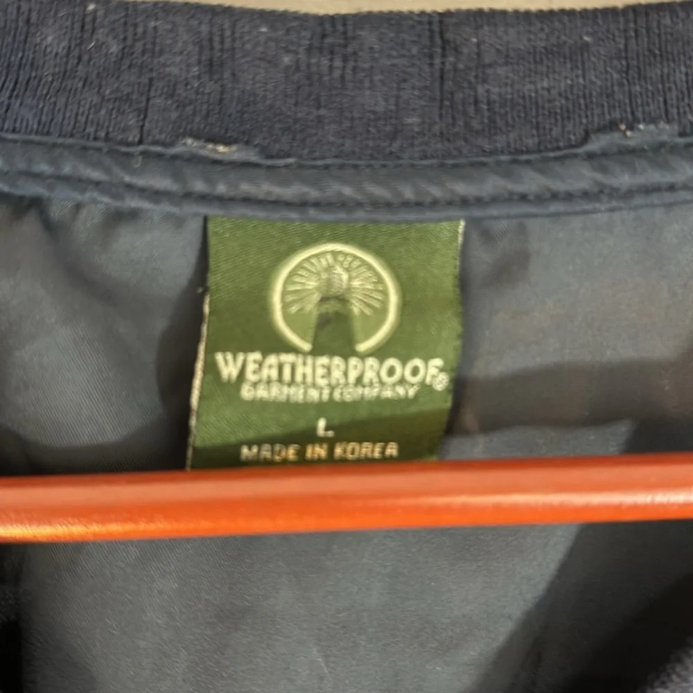 Weatherproof golf windbreaker